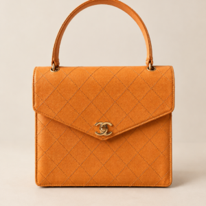 Chanel kelly top handle tas oranje huren event feest
